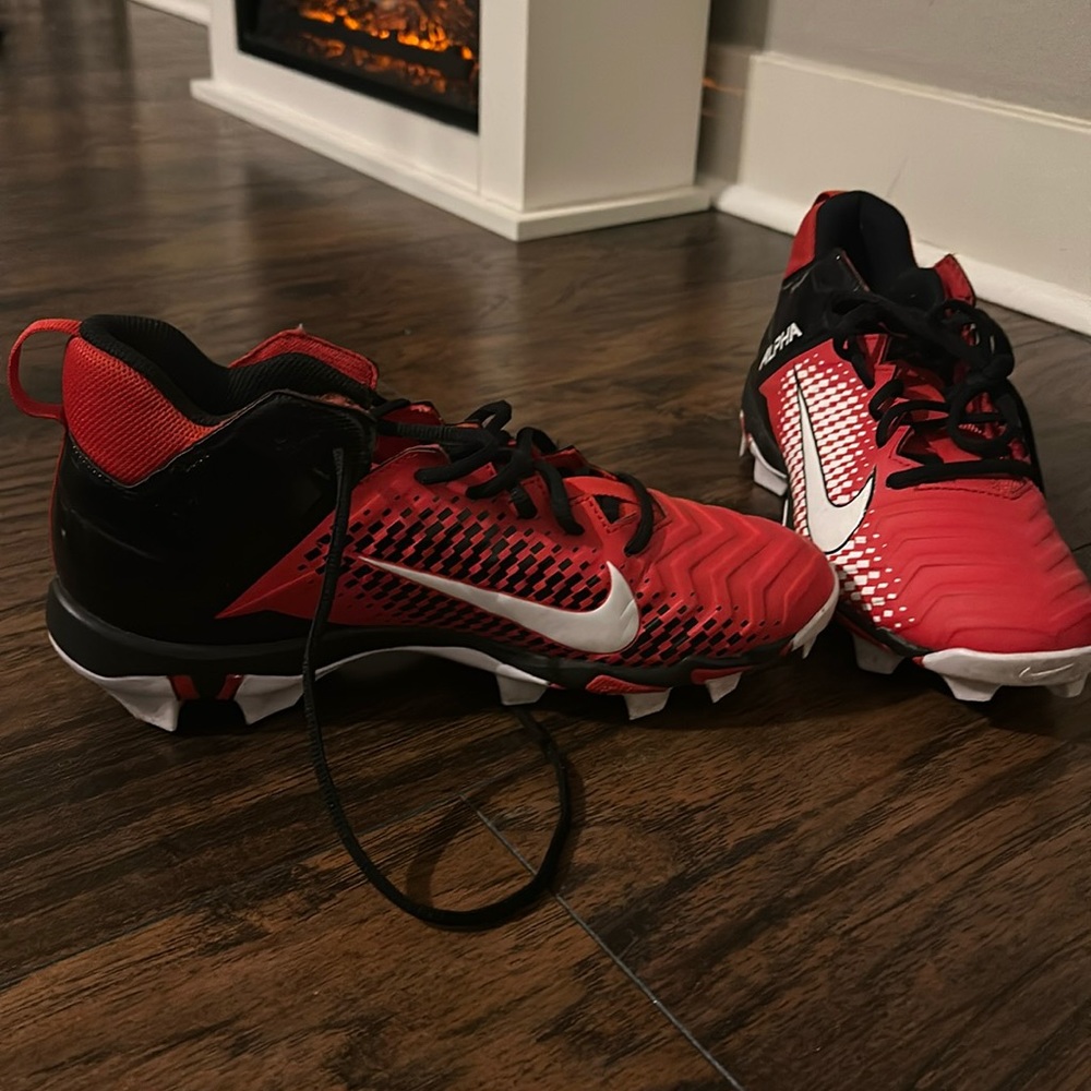 Men's size 8 red, black & white Nike Alpha Fastflex football cleats. Worn once!